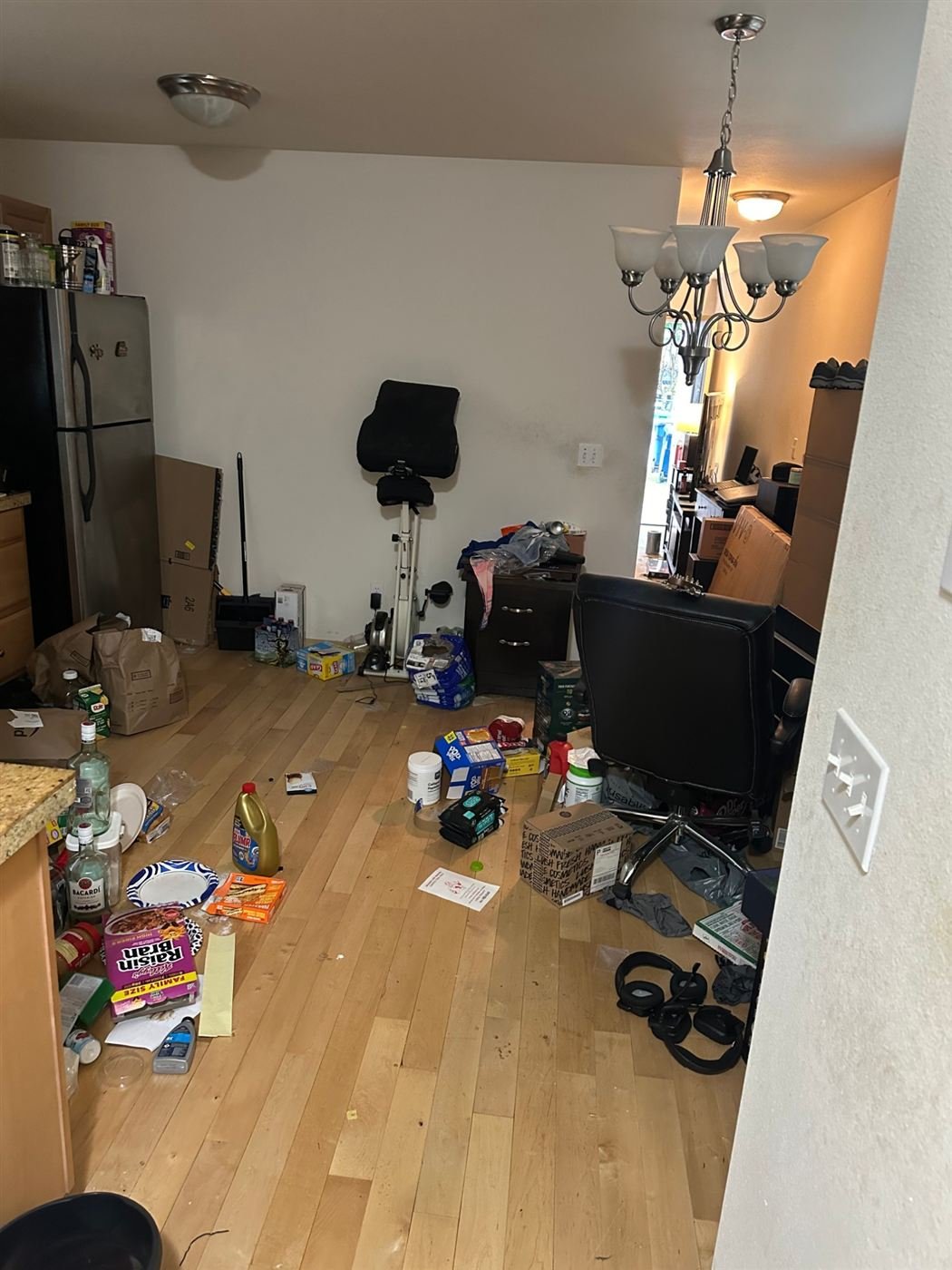 Cluttered kitchen floor before junk removal in Bellevue