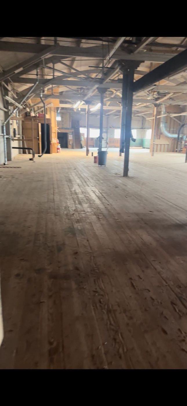 Cleared warehouse floor after a commercial clean-out